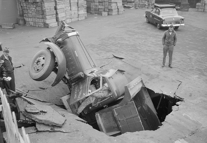 Boston Herald-Traveler photographer Leslie Jones had an eye for a dramatic scene, including when this seven-tonne dump truck plunged through the Warren Avenue bridge, in Boston